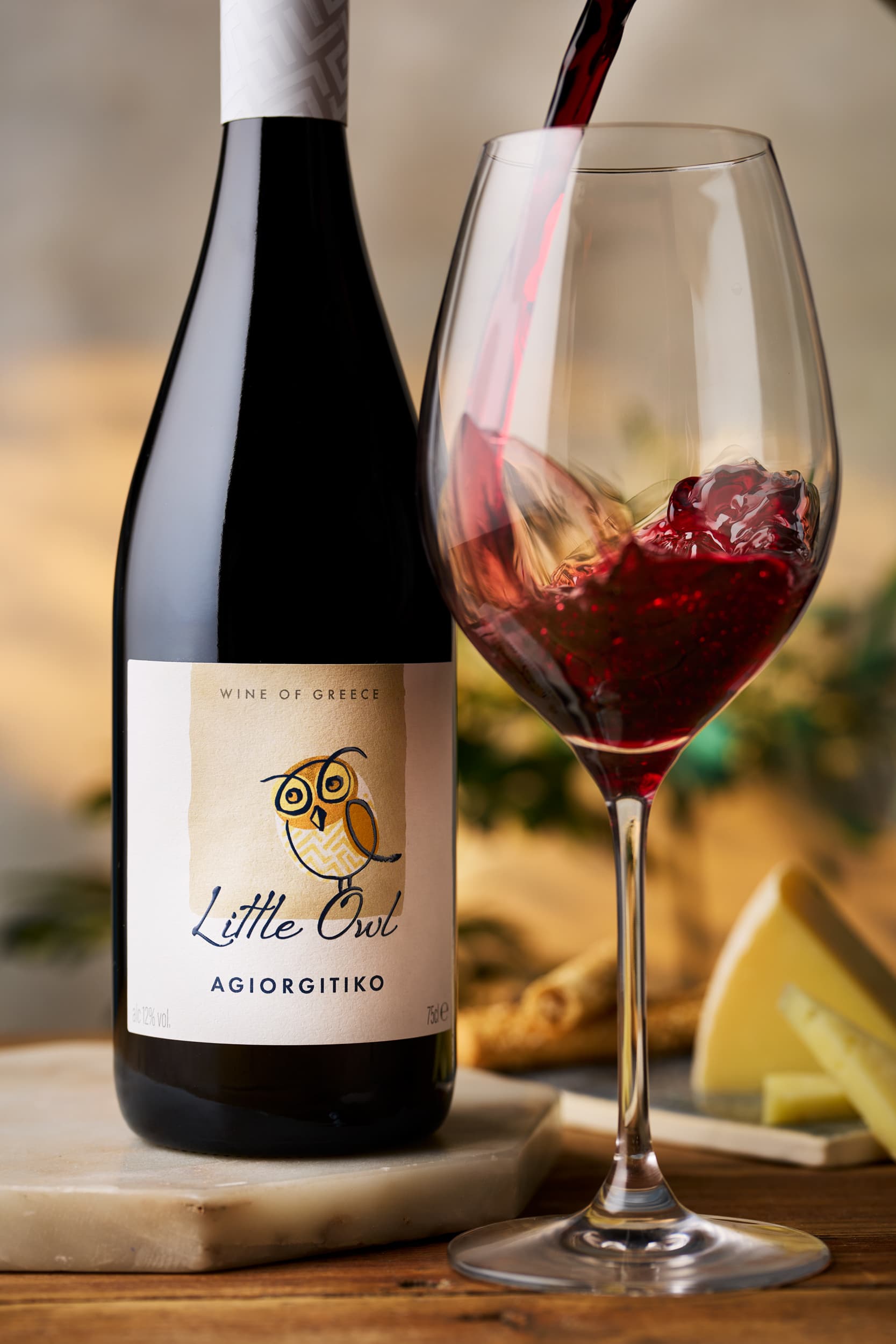 Little Owl Agiorgitiko wine with pour