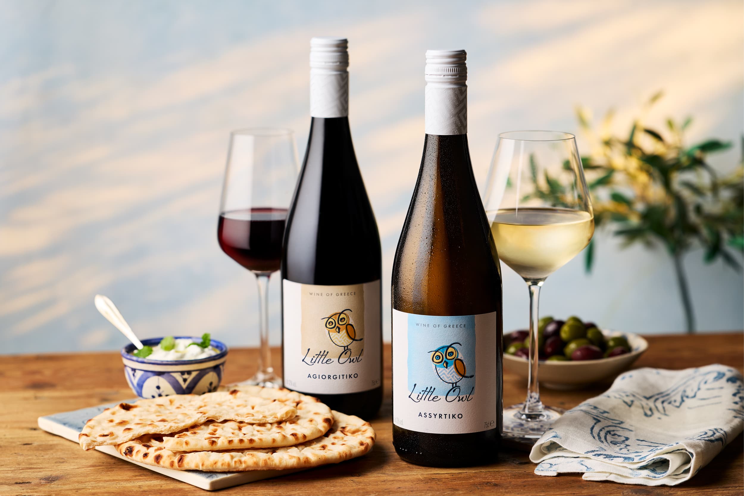 Little Owl Agiorgitiko and Assyrtiko with pita, dip, olives and wine — Greek wine for the modern table